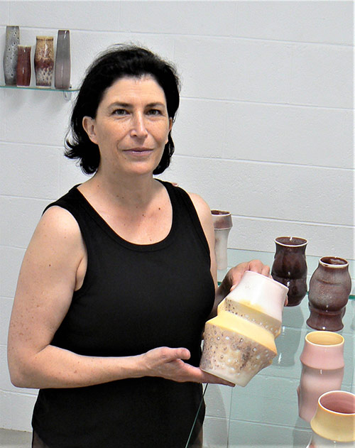 Nadine Spalter holding ceramics